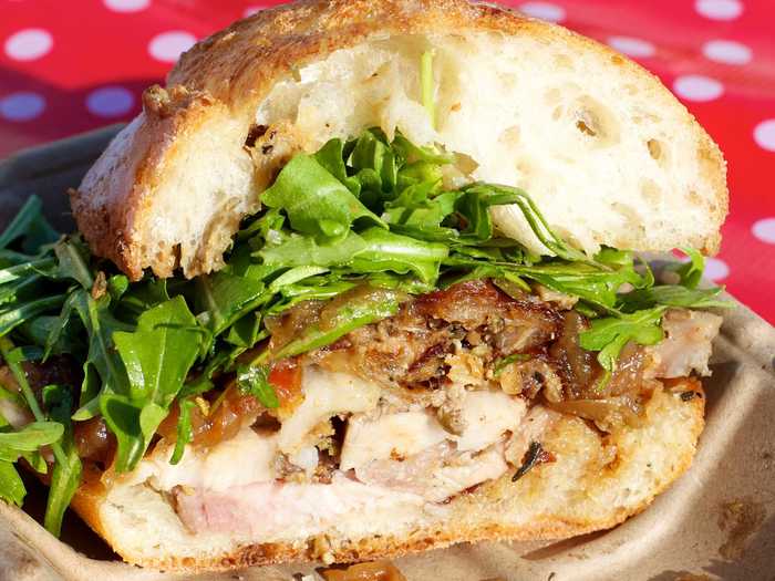 Food carts make porchetta (Italian-style pulled pork) sandwiches across the United States.