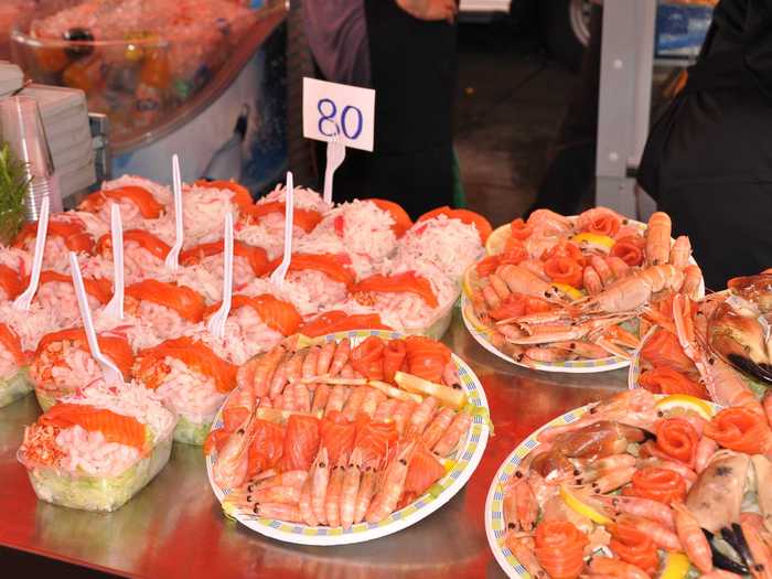 Enjoy fresh seafood by the docks in Oslo, Norway, known for its fish markets that offer staples like peel-and-eat shrimp.