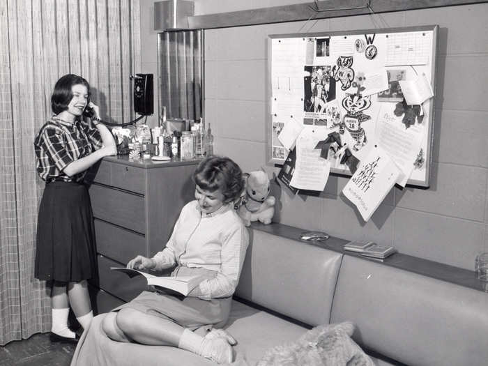 This 1950s photo features an impressive perfume collection.