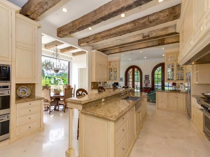 A breakfast nook holds court in front of a plate glass window, so you can catch a view while you eat your Wheaties.