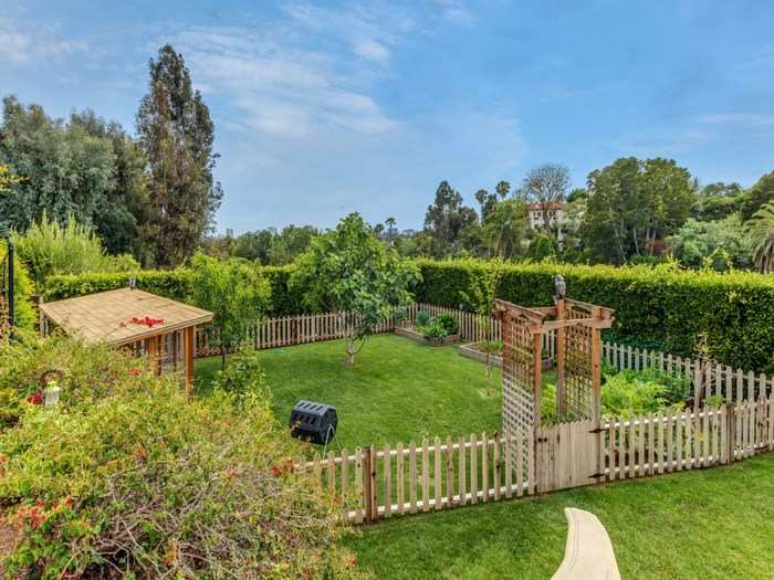 A gardening area sits off the edge of the property.