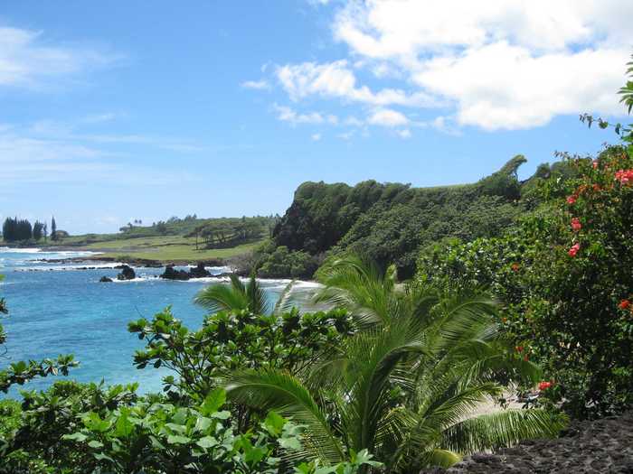 12. Hamoa Beach is one of the finest in Maui, Hawaii, due to its perfect crescent shape and the lush green cliffs that surround it.