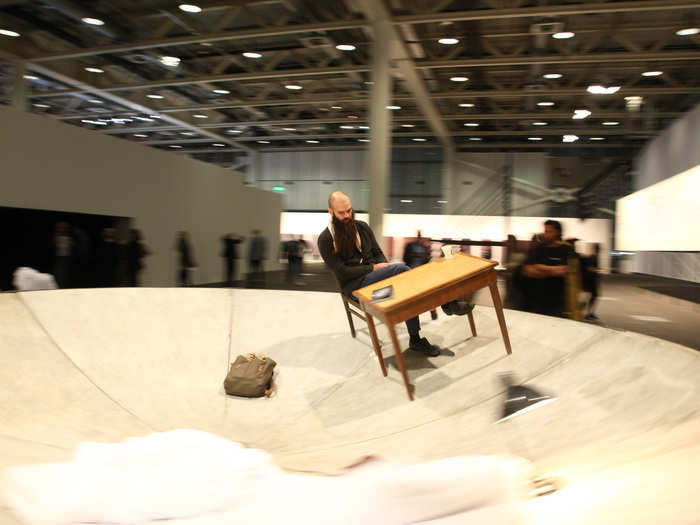 Not everything at Basel is for sale. Artist Julius von Bismarck is doing performance art on this rotating platform. The work is called “Egocentric System.”