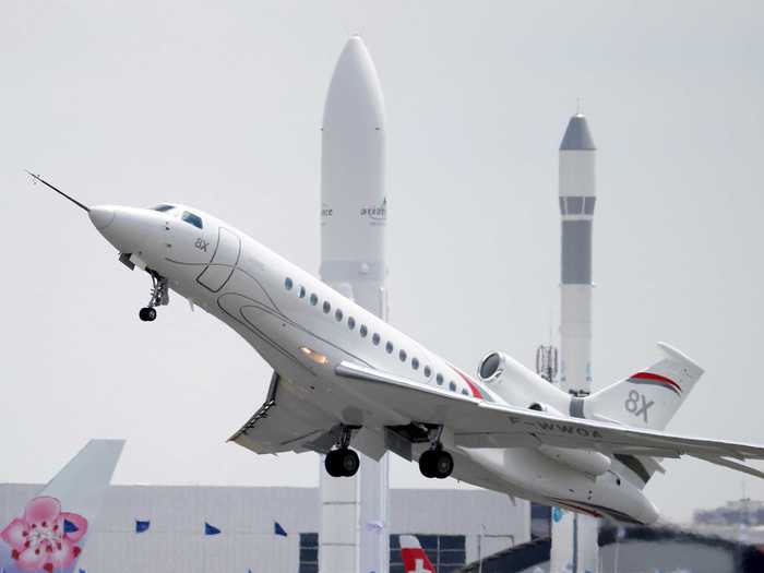 A Dassault Falcon 8X jet participates in a flying display.