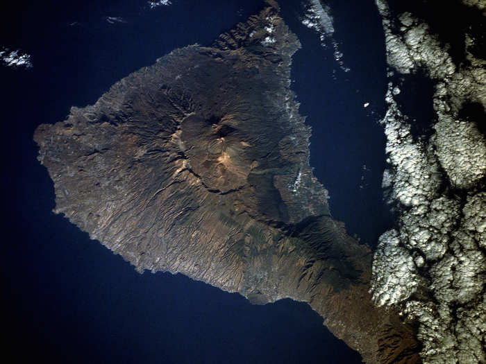 Tenerife is the largest island in the Canary Island archipelago, crowned by Pico de Teide volcano. At 12,198 feet above sea level, the peak, shown in this satellite image taken in August 1991, represents the highest elevation in the Atlantic Ocean. Teide has erupted several times since the island was settled in 1402, most recently in 1909.