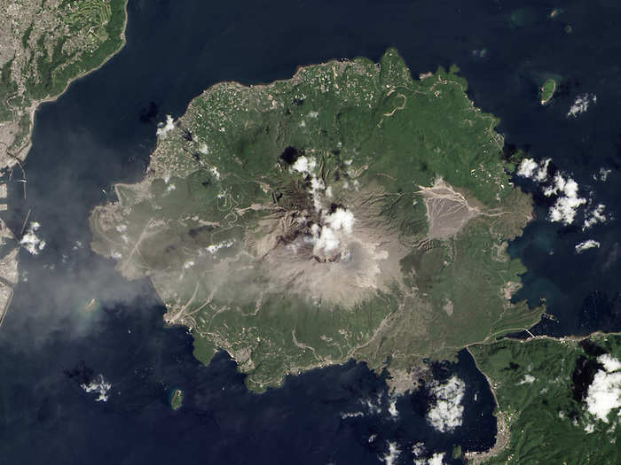 Sakurajima is an active volcano in Kyushu, Japan, which was formerly an island. In 1914, an eruption connected the island with the Osumi Peninsula. The volcano has been erupting almost continually since 1955. This satellite image taken on August 18, 2013 captured an eruption that spewed ash 20,000 feet above nearby Kagoshima Bay.