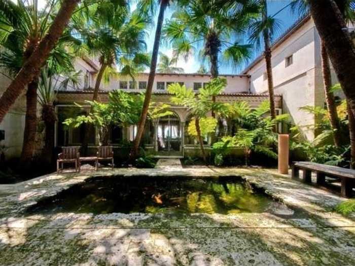 The home boasts a 6,000-gallon koi pond in the interior courtyard.