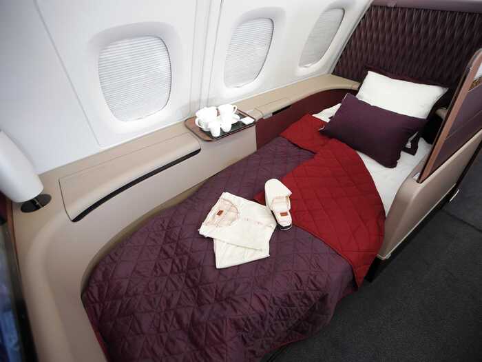 First class seats can be flattened into actual beds, so it