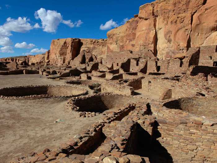 Pueblo Bonito, located in the Chaco Culture National Historical Park in New Mexico, includes remnants of the Puebloan people who built over 600 rooms in the area