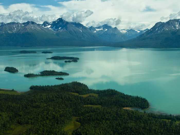 Alaska’s Lake Clark National Park, in Nondalton, offers an awe-inspiring landscape of lakes, active volcanoes, three mountain ranges, glaciers, waterfalls, arctic-like tundra, and a rainforest. Since it is not on the road system, access is primarily through aircrafts, either from a one to two hour flight from Anchorage, Kenai, or air taxis in the area where you can get drop-off services.