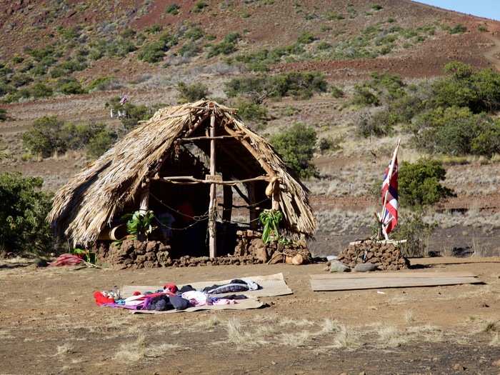 Some protesters spent the night on the mountainside to ensure they beat construction vehicles there. Even in the summer, nighttime temperatures on the volcano can dip near freezing. The huts and tents did not look warm.