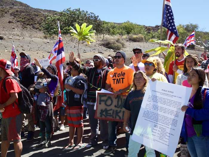 Shortly after I arrived, protestors began singing, chanting, and praying.