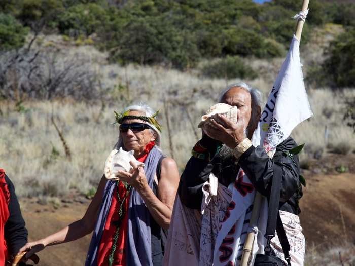 Many people blew through conch shell horns. The deep, resonate sound carried a long way down the mountain — it was the first thing I heard as I neared the Visitor