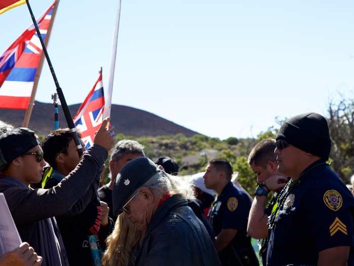 Protesters stood face-to-face with police and DLNR officers throughout the slow march. It was clear a lot of the state officials had a hard time keeping it together.