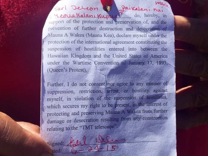 DeLeon carried around this card explaining why he protested on Mauna Kea.