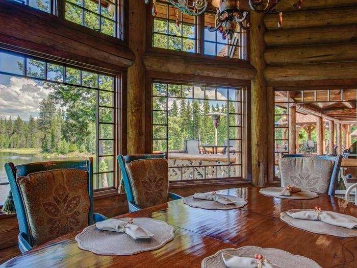 In the dining room, floor-to-ceiling windows allow you to feast with a view.