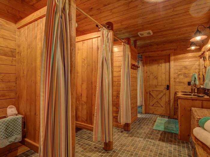 These sauna booths have the added benefit of privacy curtains.