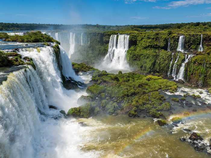 The Iguazu National Park, located on the Northeastern tip of Argentina and bordering the Brazilian state of Parana, hosts a semicircular waterfall which actually forms the border between the two countries and has a diameter of almost 300 meters (984 ft.).