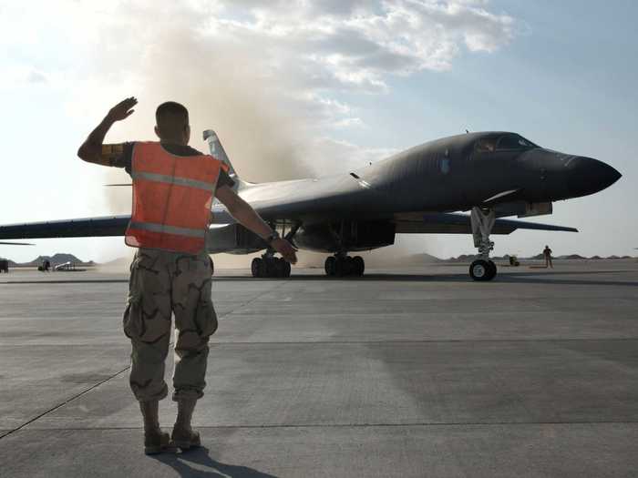 An Air Force B-1 crew chief from the 405th Air Expeditionary Wing launches a B-1B bomber for a combat mission.