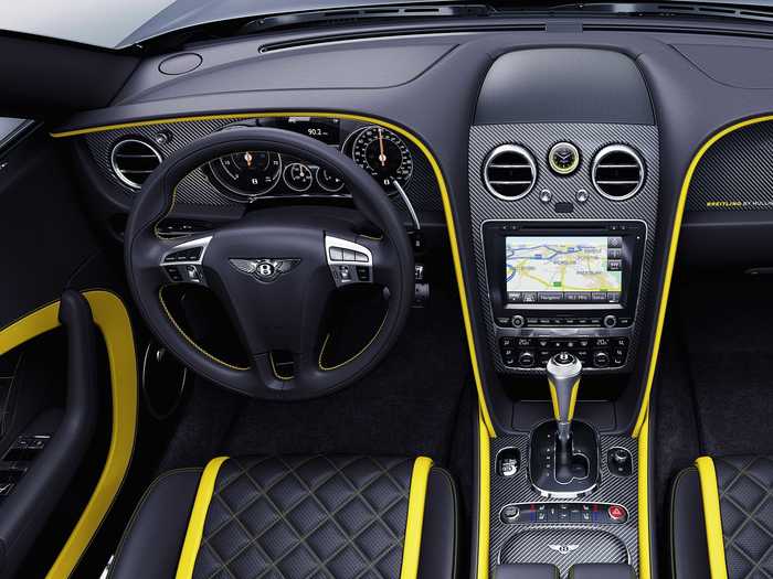 Yellow interior stitching is meant to mimic the cockpit of a Breitling Jet Team aircraft, and the headrests carry the number of the corresponding plane.