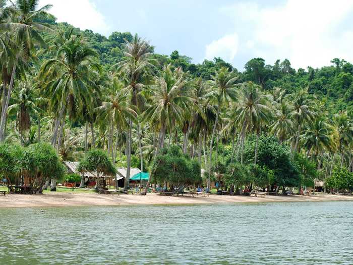 If you’re looking for a quiet getaway, take the boat ride from Kep in Cambodia to Koh Tonsay, where you’ll find white sand beaches overlooking clear waters. The sea is shallow with a variety of corals, making it a good place to witness marine life while swimming.