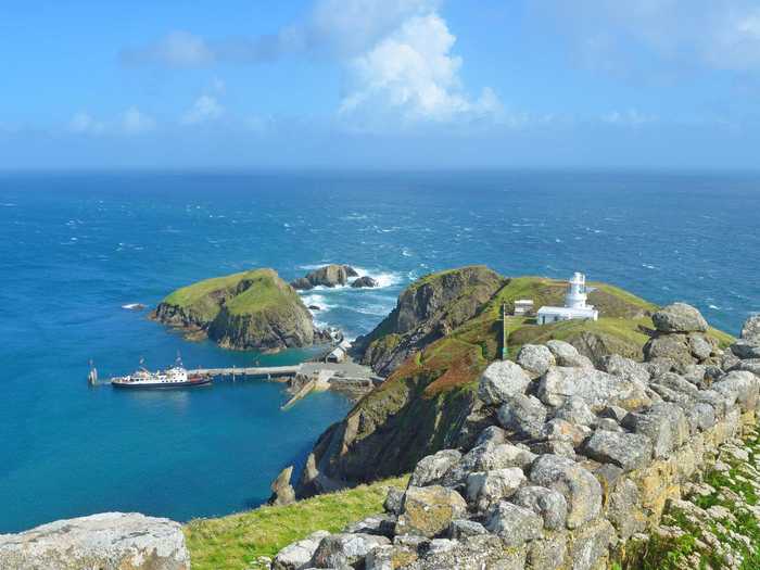 Lundy Island, a tiny island located 12 miles off the north coast of Devon, England, is a prime spot to see grey seals, dolphins, and seabirds.