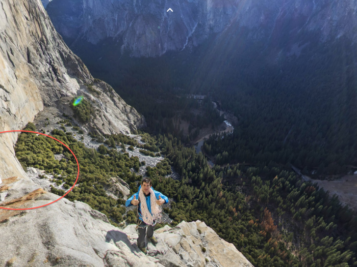 There’s no bathroom so climbers have to carry a poop can like that white bucket in the red circle.