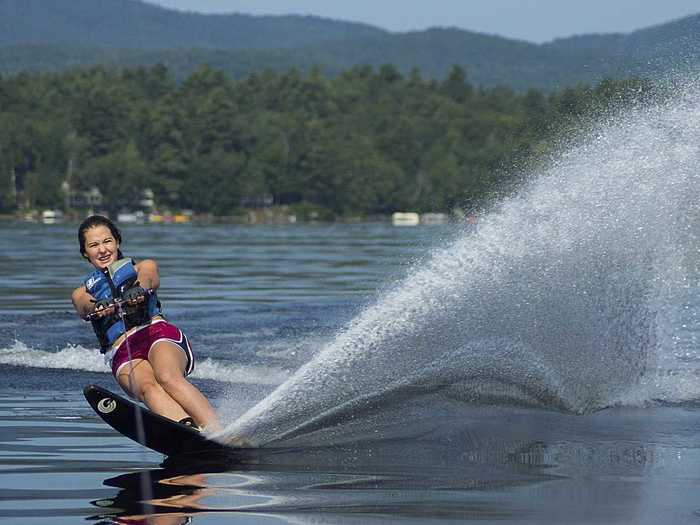 Waterski on a lake.