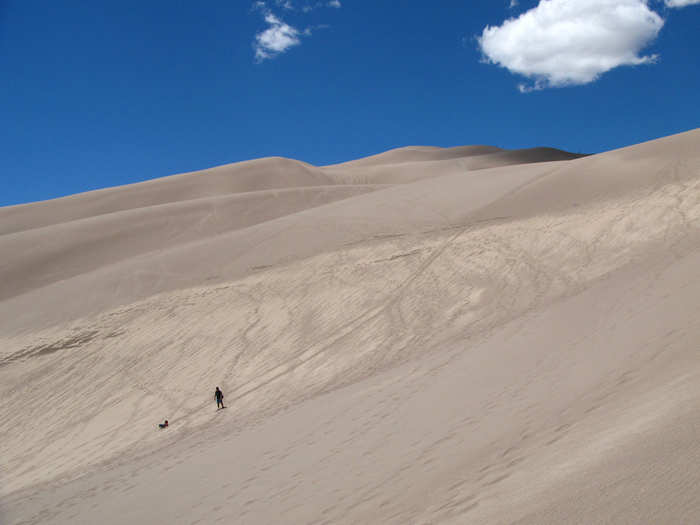 Go sandboarding at Great Sand Dunes National Park in Colorado.