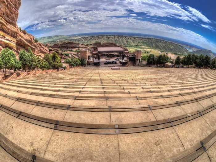 Catch a concert at the stunning Red Rocks Amphitheatre in Morrison, Colorado.