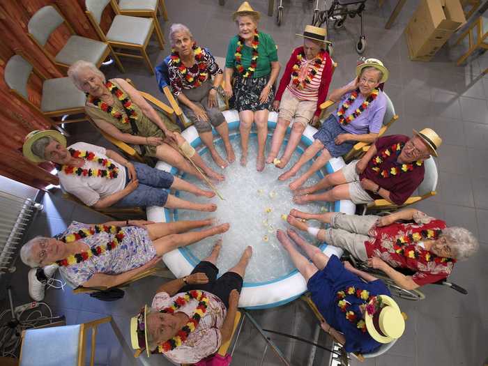 A group of seniors at the Ter Biest house in Grimbergen, Belgium socialized while they soaked. The UN warned European nations that children and the elderly are at the highest risk during extreme temperatures.