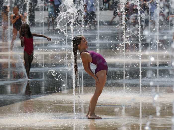 Also in Nice, young children skipped through the fountains to beat the heat. The 90 plus degree temperatures are supposedly due to hot air traveling north from Africa towards Western Europe.