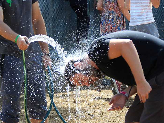 A regular old hose fended off the heat at the Euskal Herria Zuzenean music festival in Mendionde, France.