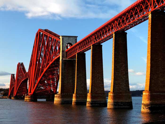The Forth Bridge, which spans the Forth River in Scotland, is the world’s longest multi-span cantilever bridge.