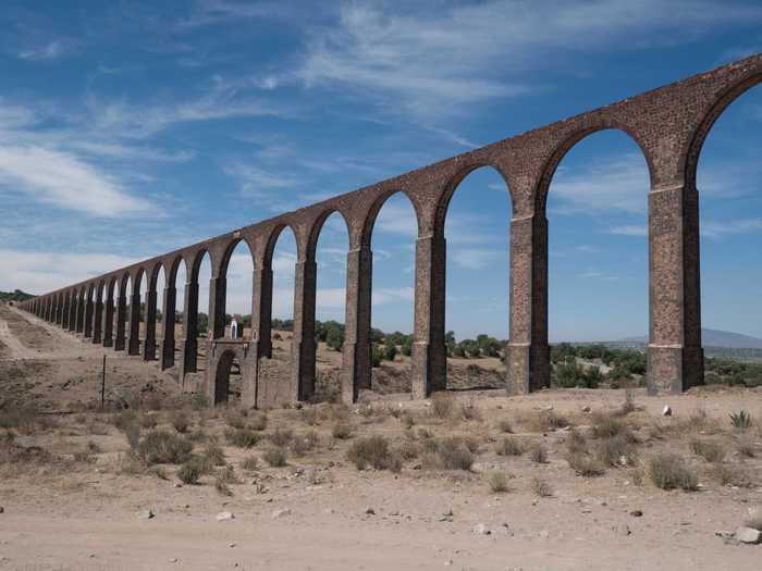 The Aqueduct of Padre Tembleque Hydraulic System sits between Mexico and Hidalgo on the Central Mexican Plateau. It is a 16th-century aqueduct which includes springs, canals, distribution tanks, and the highest single-level arcade to ever be built in an aqueduct.