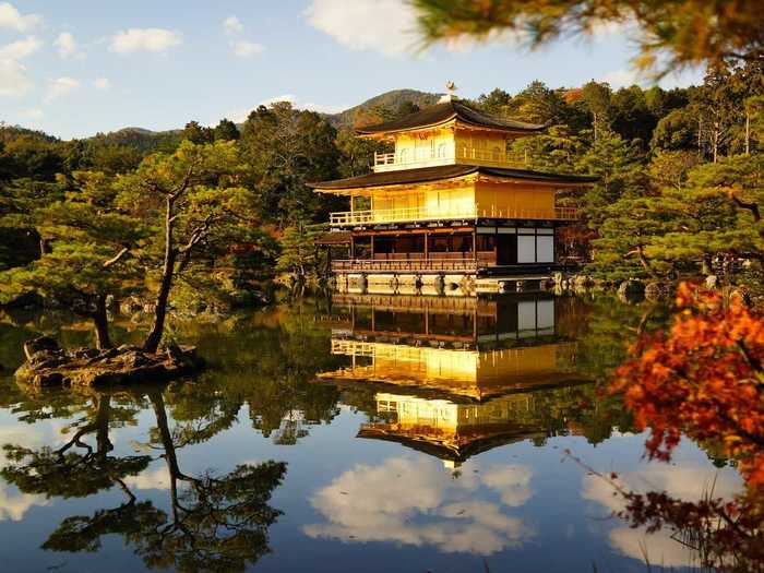 One of the most breathtaking temples is the 14th-century Kinkaku-ji (Golden Pavilion), which has a shiny gold facade that reflects beautifully in the pond it sits on.