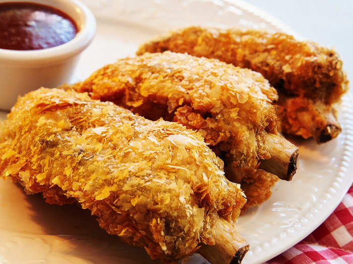 Deep Fried Ribs: Smoked baby back ribs, breaded, fried and served with BBQ sauce.