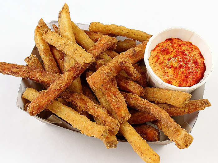 Indi Frites: Indian-seasoned russet and sweet potato fries in a crispy batter.