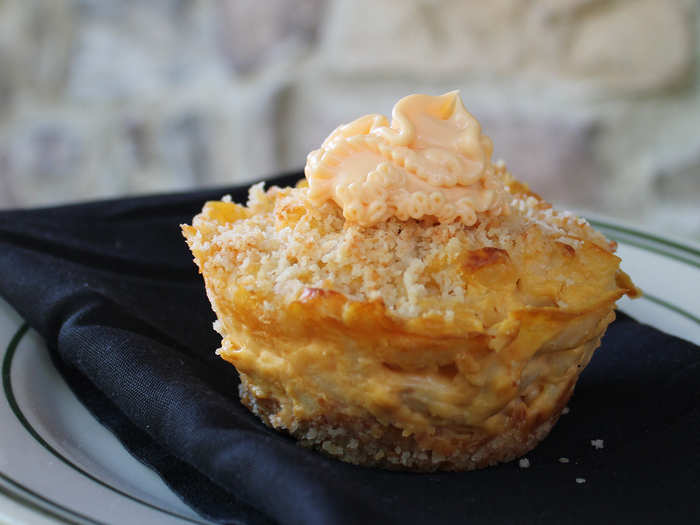 Mac & Cheese Cupcake: Mac & cheese nestled in a breadcrumb crust, then sprinkled with breadcrumbs and frosted with a dollop of Cheez Whiz.