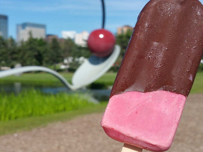 Chocolate-Dipped Cherry On-a-Spoon JonnyPop: Fresh tart cherries and cream, dipped in dark chocolate and served not on-a-stick but a spoon, inspired by Minneapolis’ Spoonbridge and Cherry sculpture.