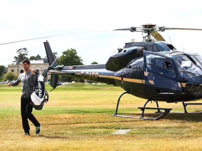 Djokovic likes to arrive in style, showing up to the 2015 Boodles Wimbledon warm-up event in a helicopter.