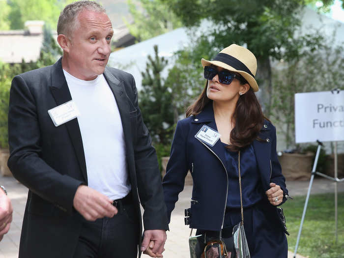 François-Henri Pinault, CEO of Kering, walks with his Oscar-nominated wife, actress Salma Hayek.