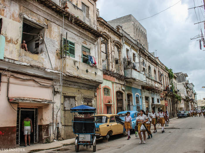 Far from the tourist hotspots, the severely impoverished neighborhood of Centro Habana bustled with life.