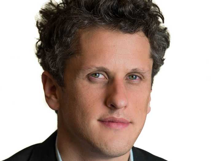 Box CEO Aaron Levie clears out his inbox from bed.