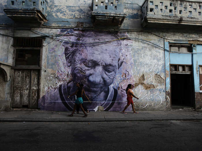 For another iteration of "Wrinkles of the City," JR worked with Cuban-American artist Jose Parla to create images of the elderly in Cuba and paste them along with Parla