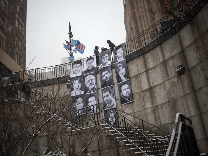 In 2014, volunteers hung an installation by JR outside the UN Headquarters in New York City. The work featured portraits of 13 Iranian "prisoners of rights."