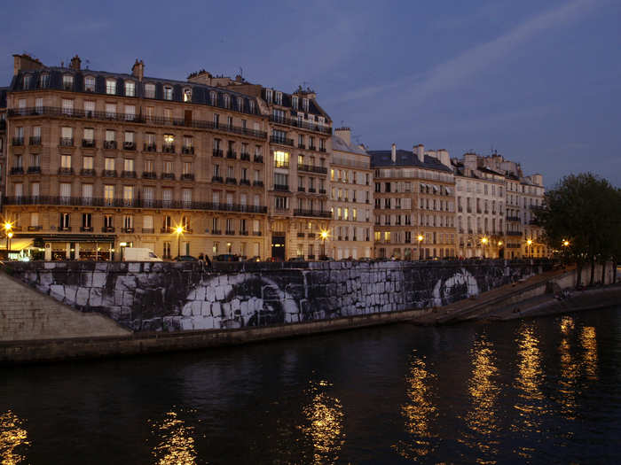 "Women are Heroes" was also displayed in Paris. JR placed an illustration of a pair of eyes along a riverbank in the city in 2009.