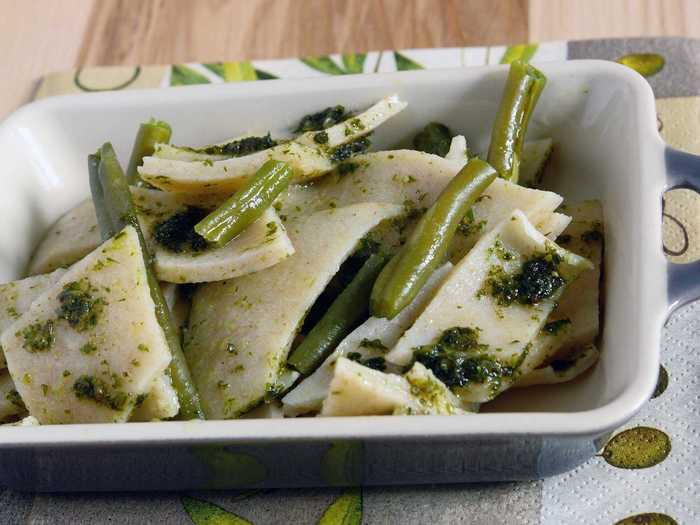 Also a specialty of Liguria, Testaroli is a flat pancake-like noodle that is traditionally served with pesto from the region.