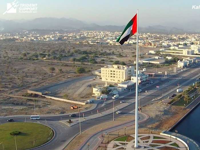 Not every flag they build in their "Monumental" and "Stately" flagpole lines are record-breakers. This one is in Kalba in the UAE is a mere minnow — just 75 meters tall.