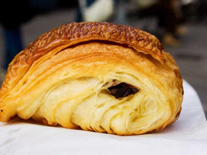 Pain au chocolat translates literally to chocolate bread, a genius combination that French bakers have mastered. Biting into one of these pastries provides the perfect combination of flaky crust and rich chocolate.